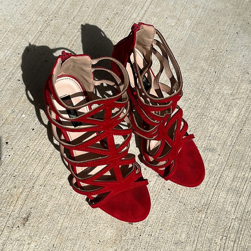 Red strappy heels